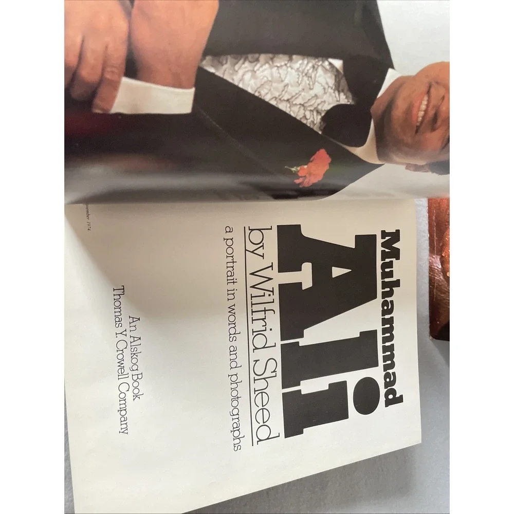 Muhammad Ali: A Portrait in Words and Photographs by‎ Wilfrid Sheed ** Read**